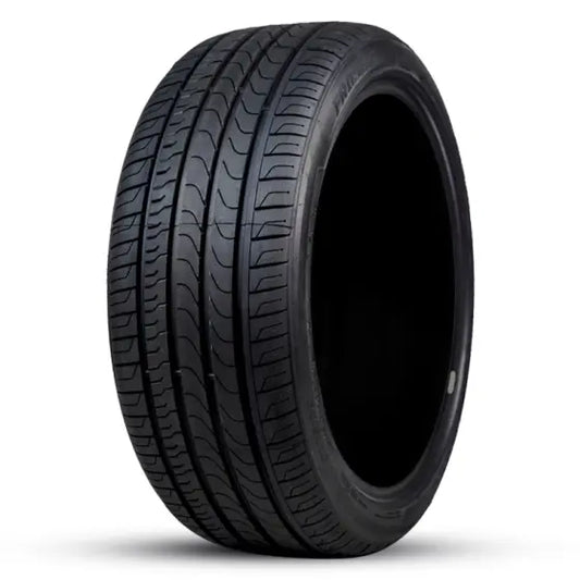 Black tire with tread pattern on a white background