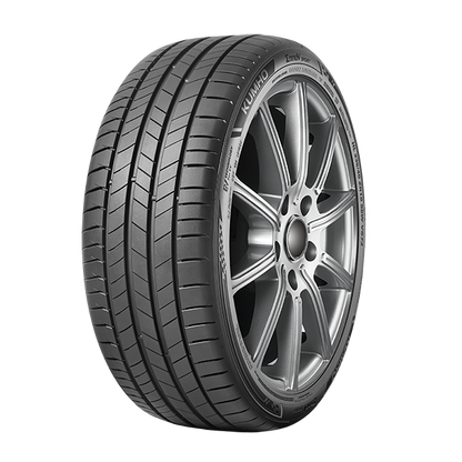 Car tire with a silver alloy wheel on a white background