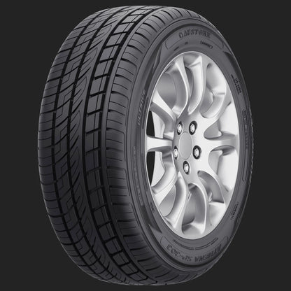 Car tire with silver alloy wheel on a black background