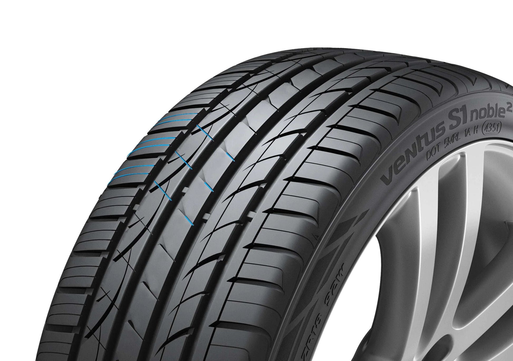 Car tire with visible branding on a white background
