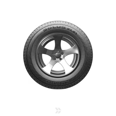 Car tire with alloy wheel on a white background